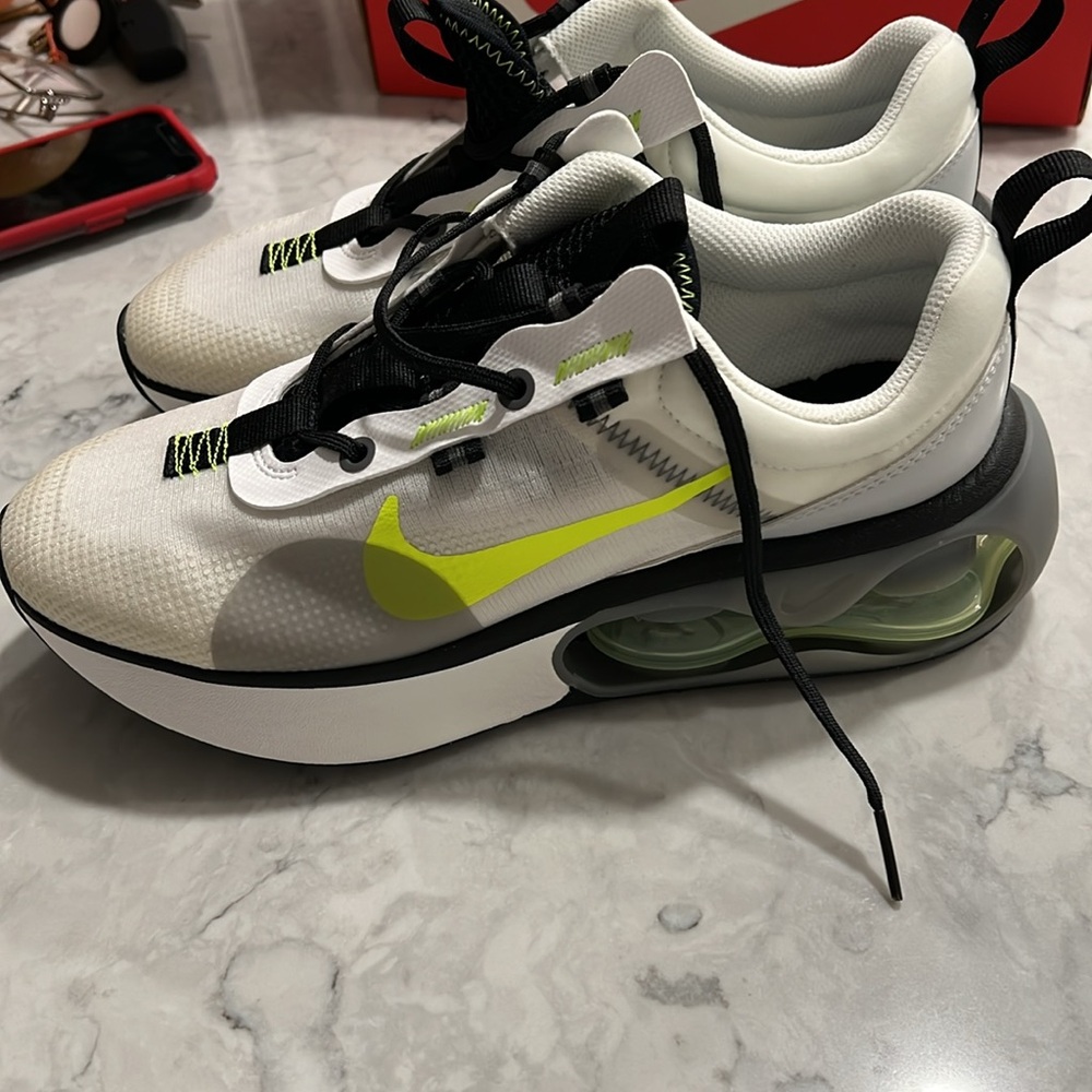 Brand new Nike boy sneaker and suddenly felt small my boy. Never wear.
